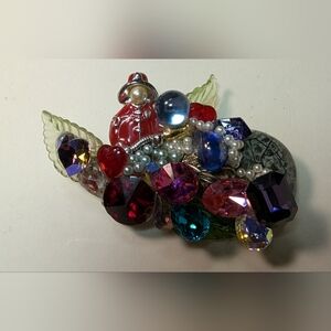 Wendy Ge11 Red fireman with Swarovski Jewels pearls and leaves.